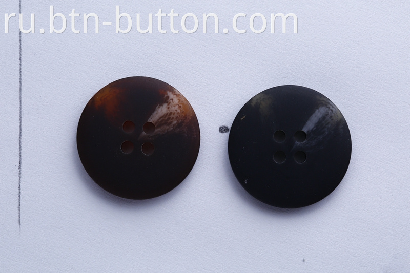 Resin buttons with good abrasion resistance